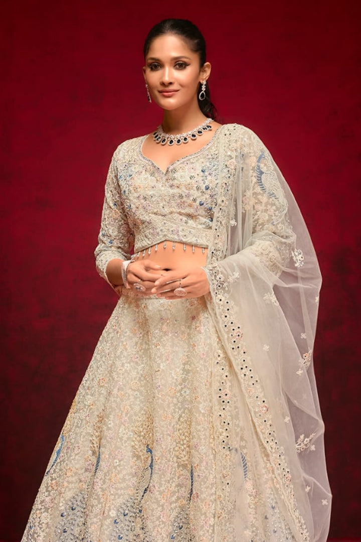 Ivory Elegance Embroidered Lehenga Choli with Floral Accents by B Girl