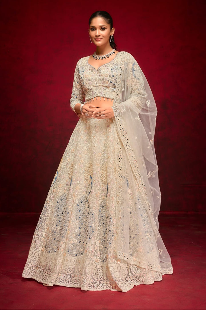 Ivory Elegance Embroidered Lehenga Choli with Floral Accents by B Girl