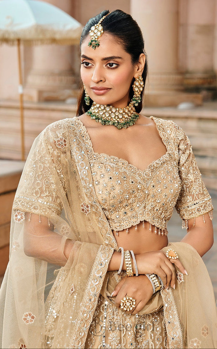 Dazzling Golden Lehenga with Delicate Tassel Accents