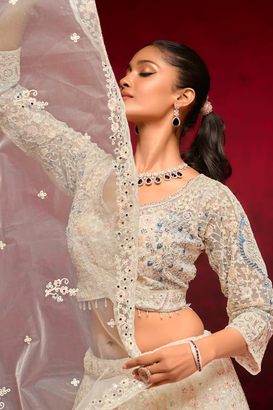 Ivory Elegance Embroidered Lehenga Choli with Floral Accents by B Girl