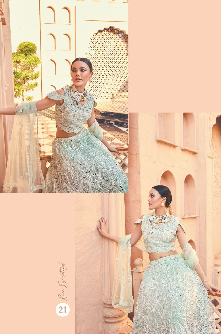 Pastel Green Heavily Embroidered Lehenga Set with Net Dupatta