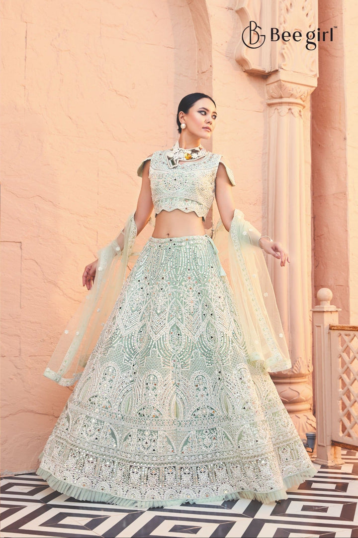 Pastel Green Heavily Embroidered Lehenga Set with Net Dupatta